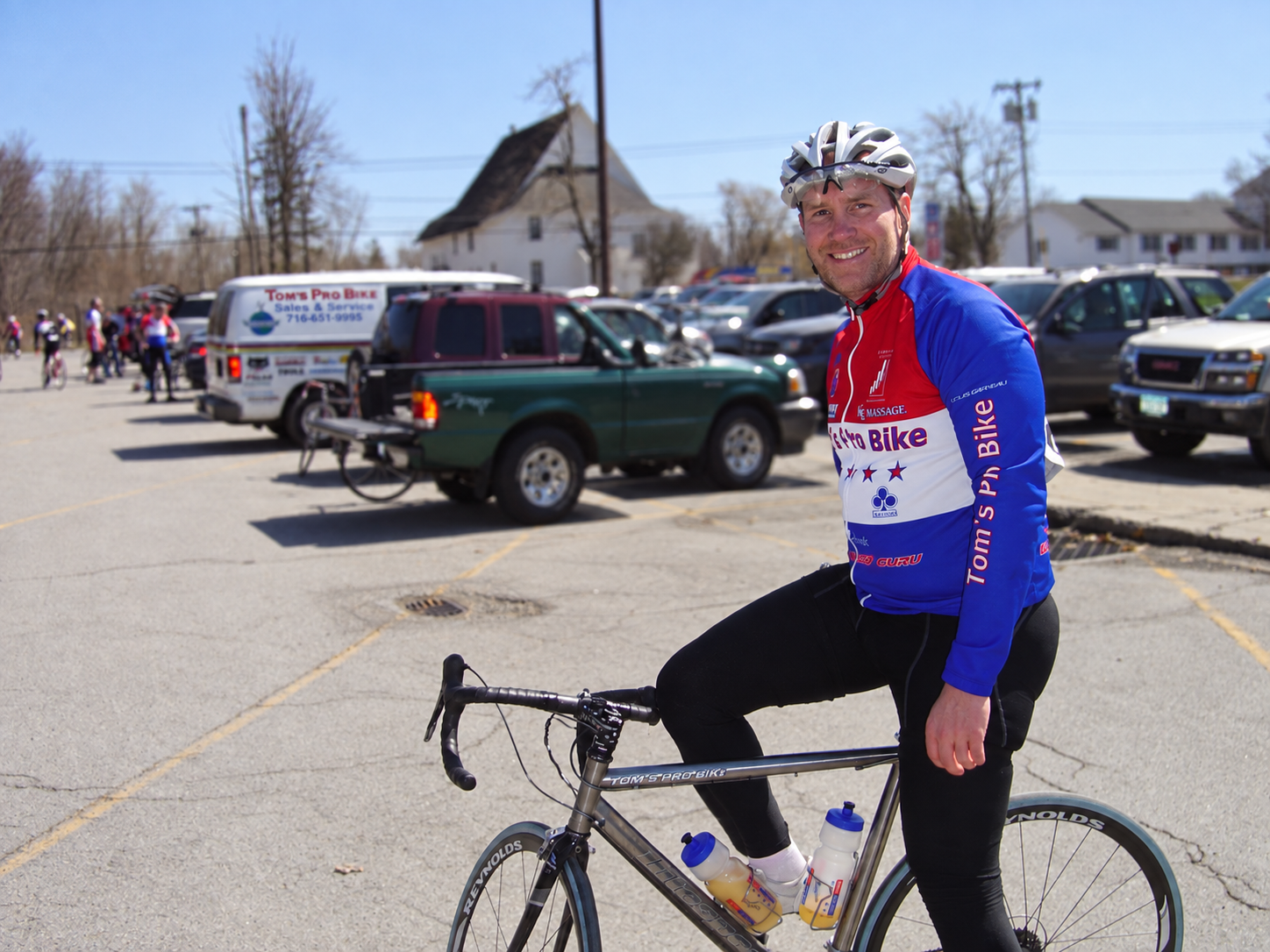 Peter seated on his road bicycle after a race