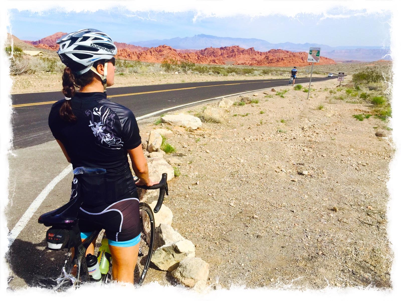 Traci beside her bicycle in the Valley of Fire landscape